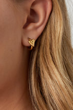 Creolen met mini hartjesoorbellen